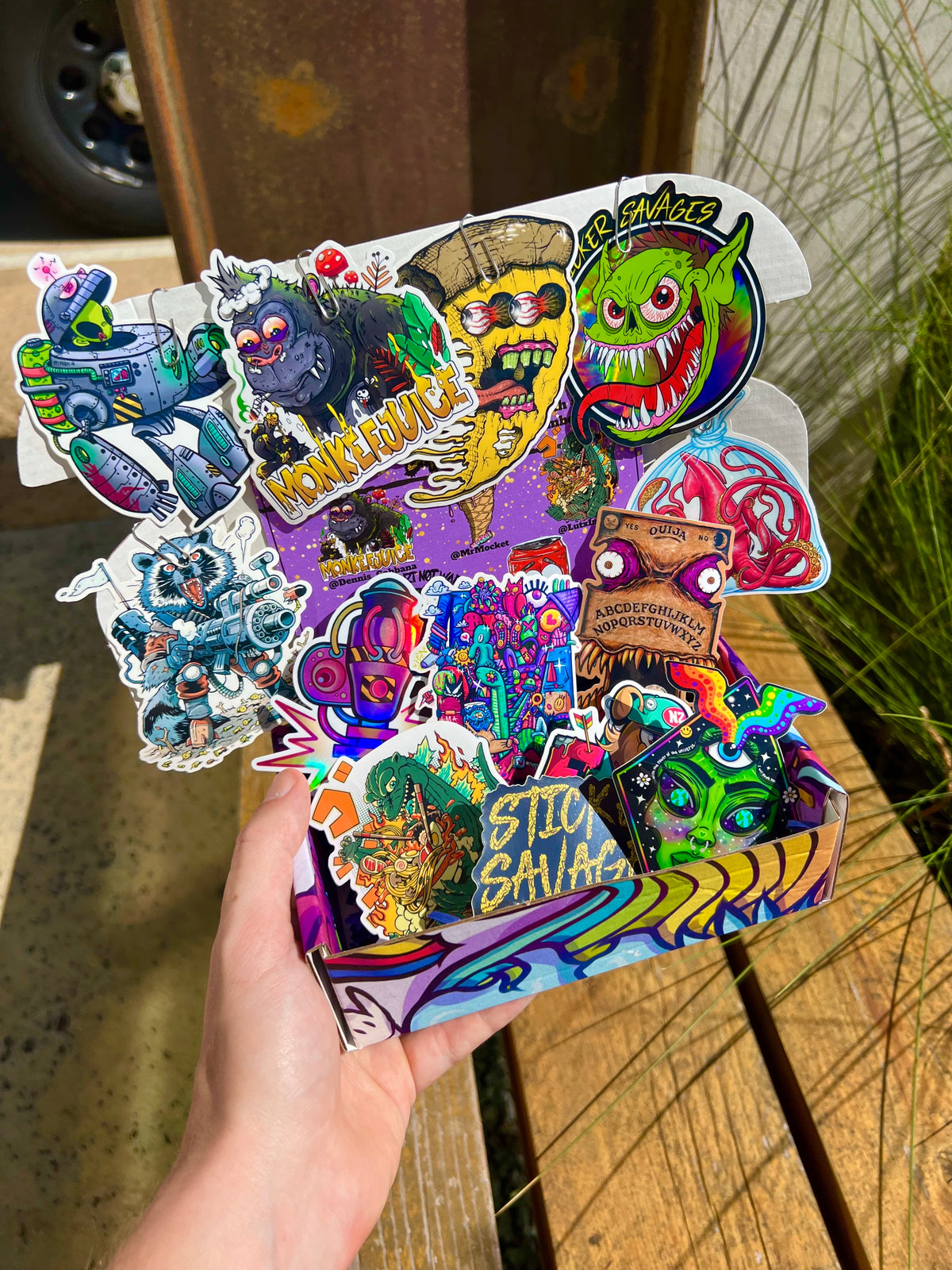 Loaded box of waterproof stickers.